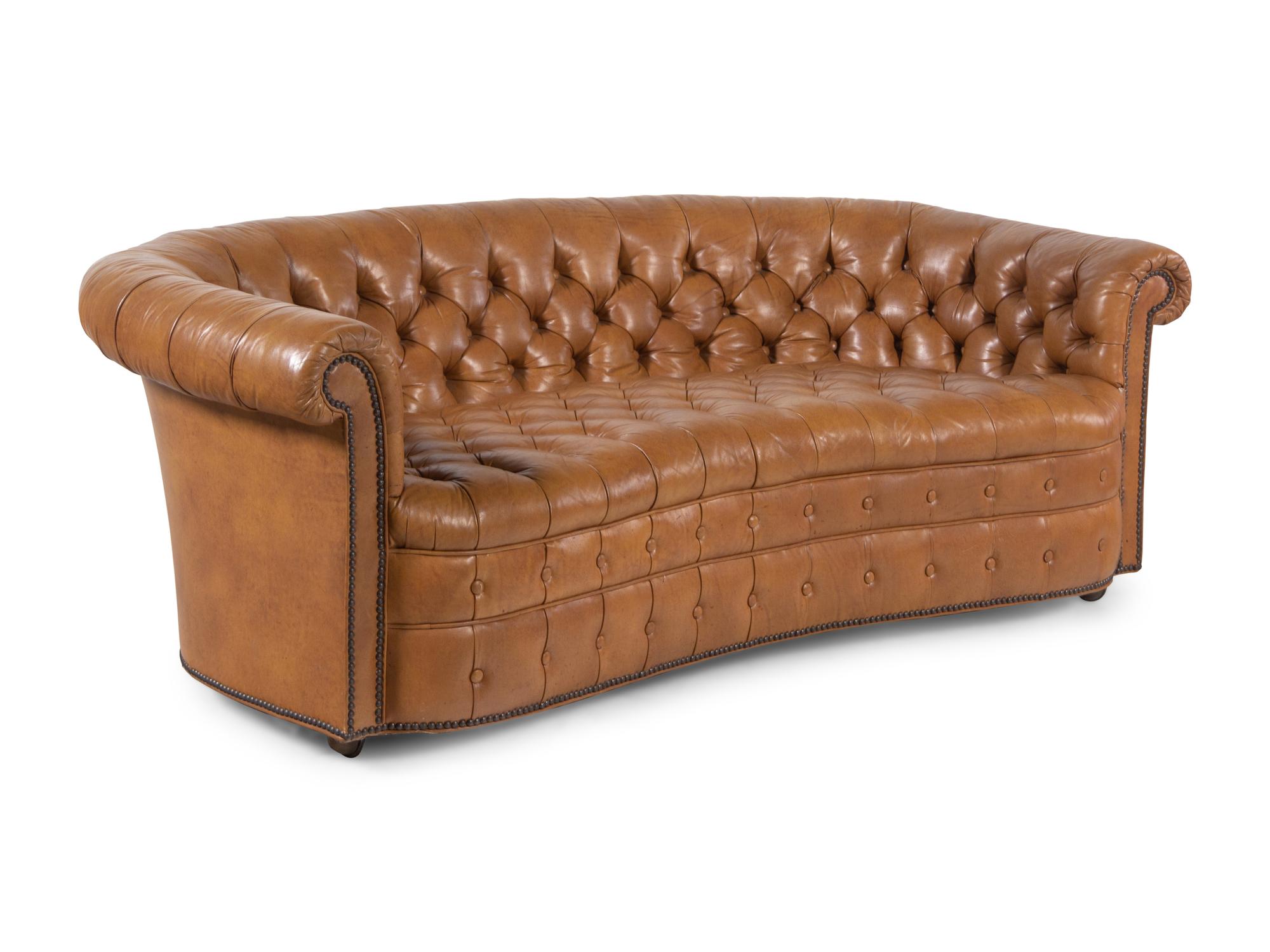 A Pair of Faux Leather Upholstered Chesterfield Sofas