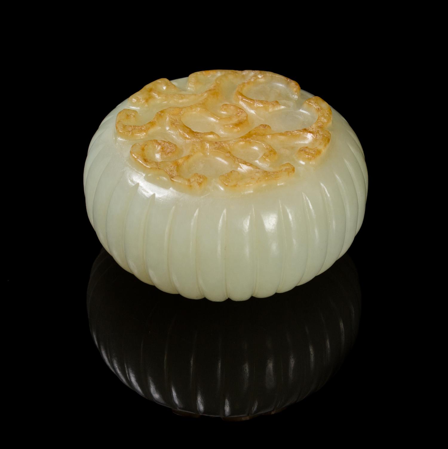 A Chinese Light Celadon Jade Fluted Water Pot 18TH/19TH CENTURY Diameter overall 2 1/8 inches. — 18TH/19TH CENTURY