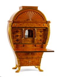 An Austrian Biedermeier Parcel Gilt Secretary Height 64 x width 43 1/2 x depth 18 inches.