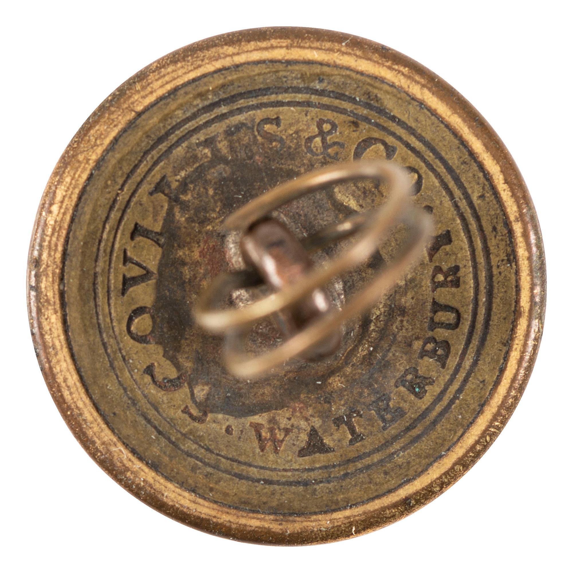 [POLITICS IN AMERICA] -- [HARRISON, William Henry (1773-1841)]. Harrison 1840 campaign coat button with ink identification tag to Thompasontown, PA Justice of the Peace J. Stewart Lukens.