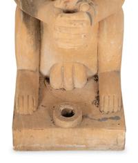 A Pair of Cast Stone Monkey-Form Torchere Holders