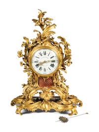 A Louis XV Gilt Bronze Mantel Clock
