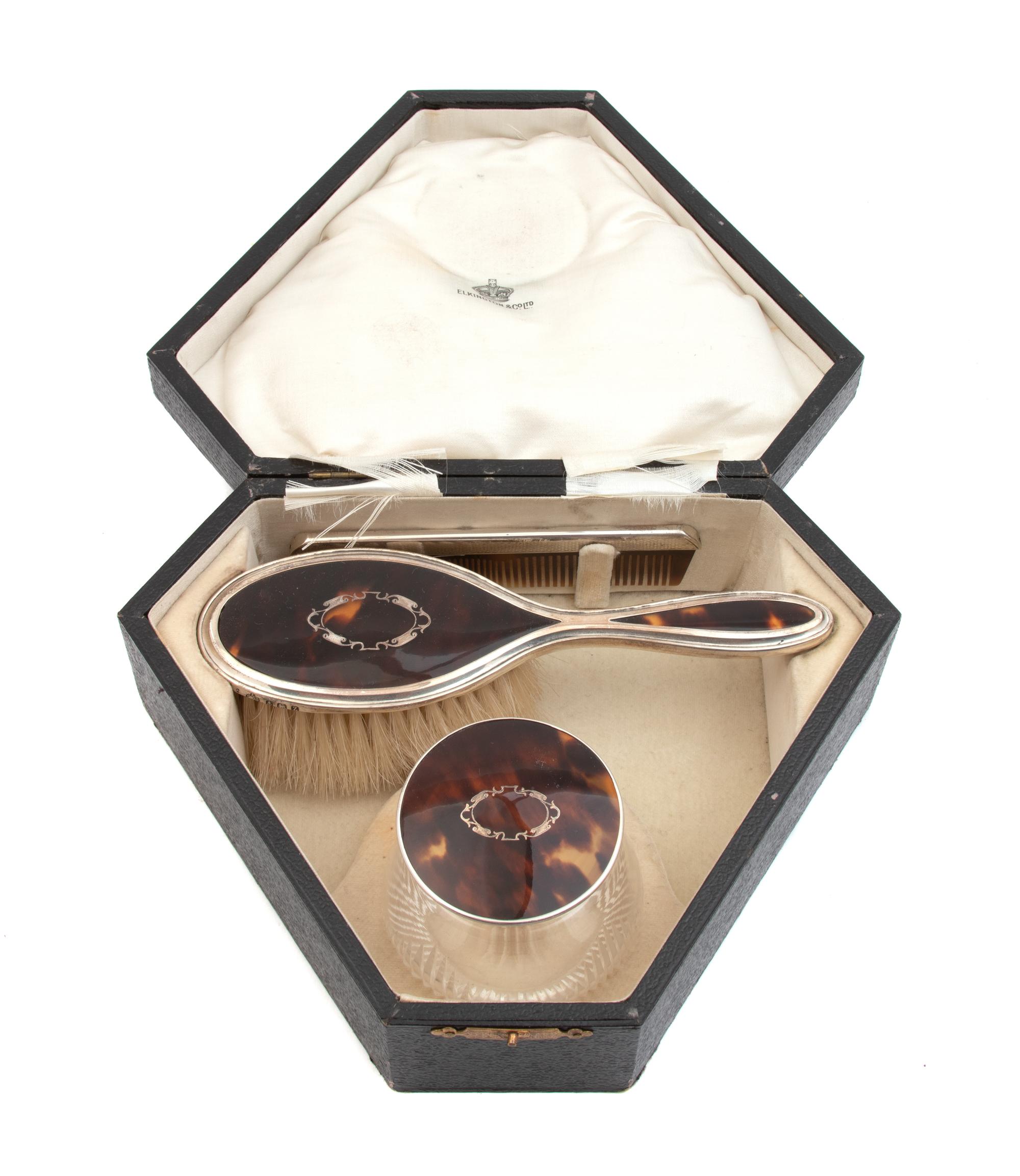 An English Silver and Tortoise Shell Three-Piece Toiletry Set — Birmingham, 1925, Ellington & Sons