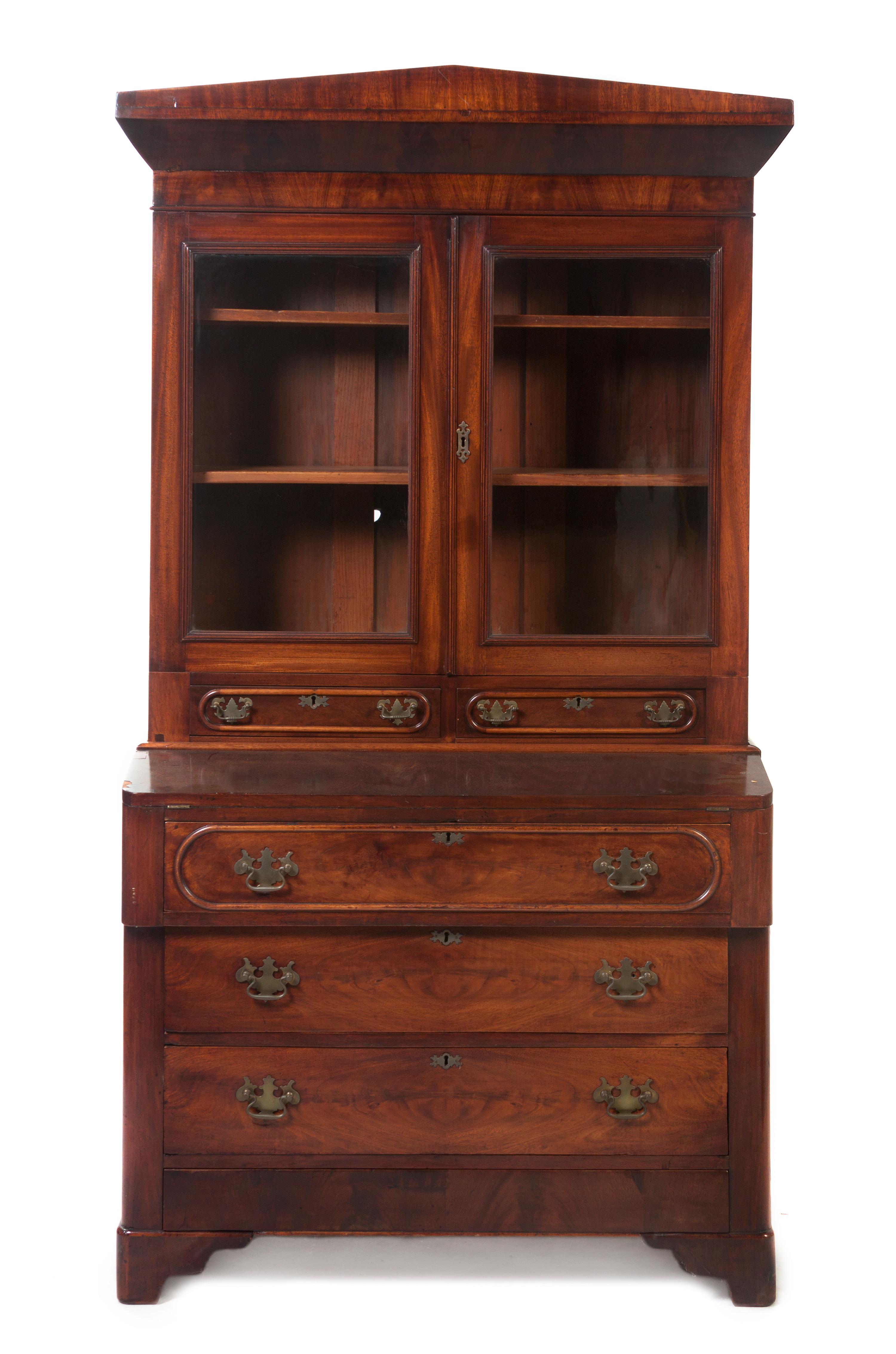 An American Empire Mahogany Secretary Bookcase, Height 74 1/2 x width 39 x depth 17 3/4 inches.