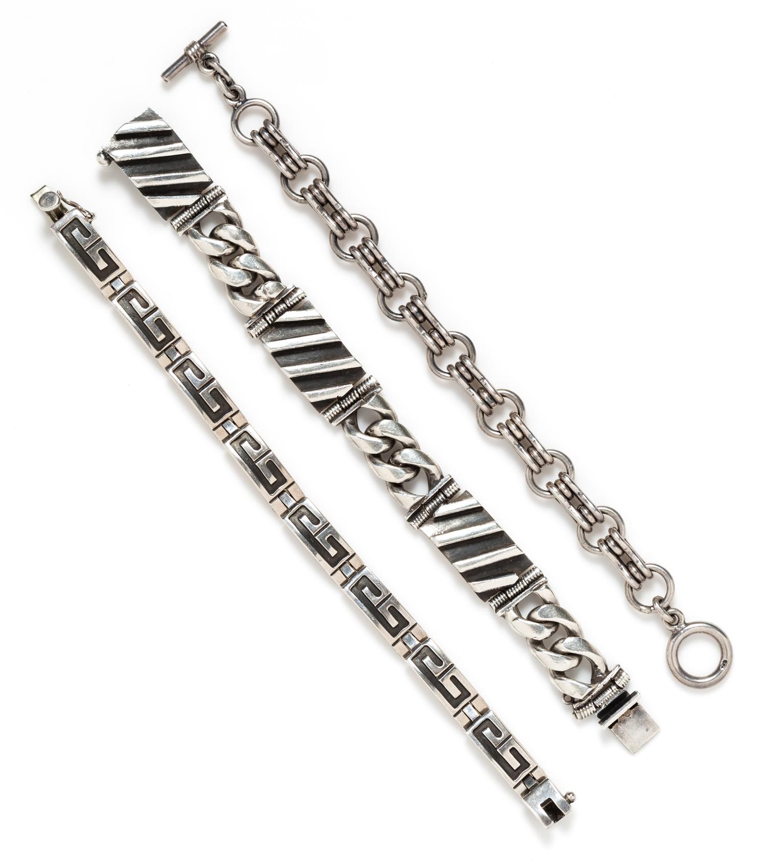 A Collection of Sterling Silver Bracelets, 164.90 dwts.