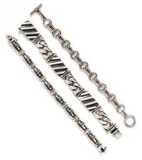 A Collection of Sterling Silver Bracelets, 164.90 dwts.