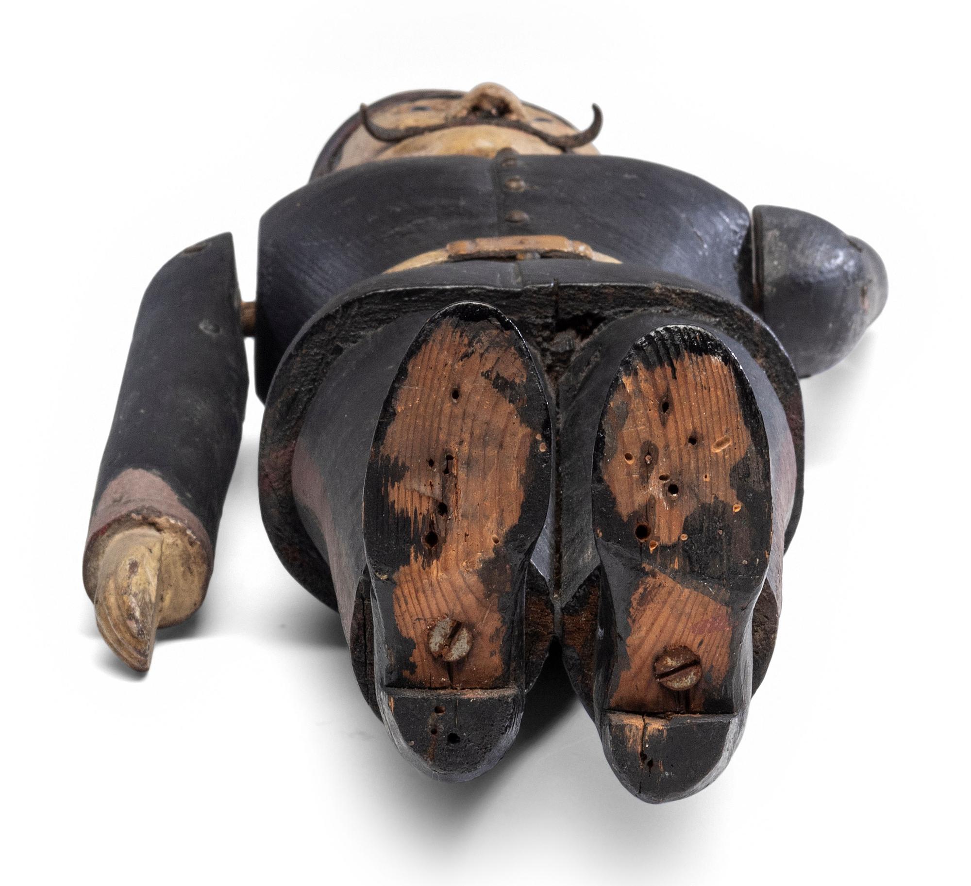 A Carved and Painted Wood Marching Band Cymbal Player Whirligig