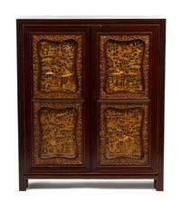 A Chinese Export Gilt Lacquered Rosewood Cabinet Height 73 1/2 x width 32 1/2 x depth 16 inches. — EARLY 20TH CENTURY
