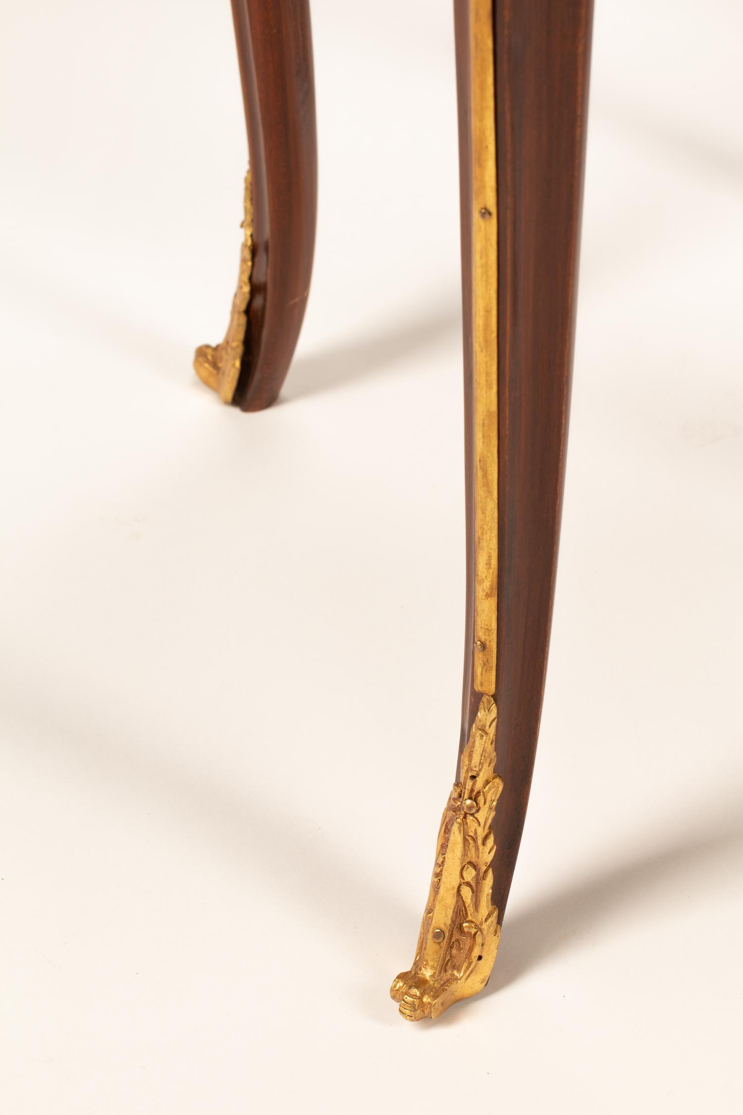 A Pair of Louis XV Style Gilt Bronze and Gilt Metal Mounted Marble-Top Gueridons