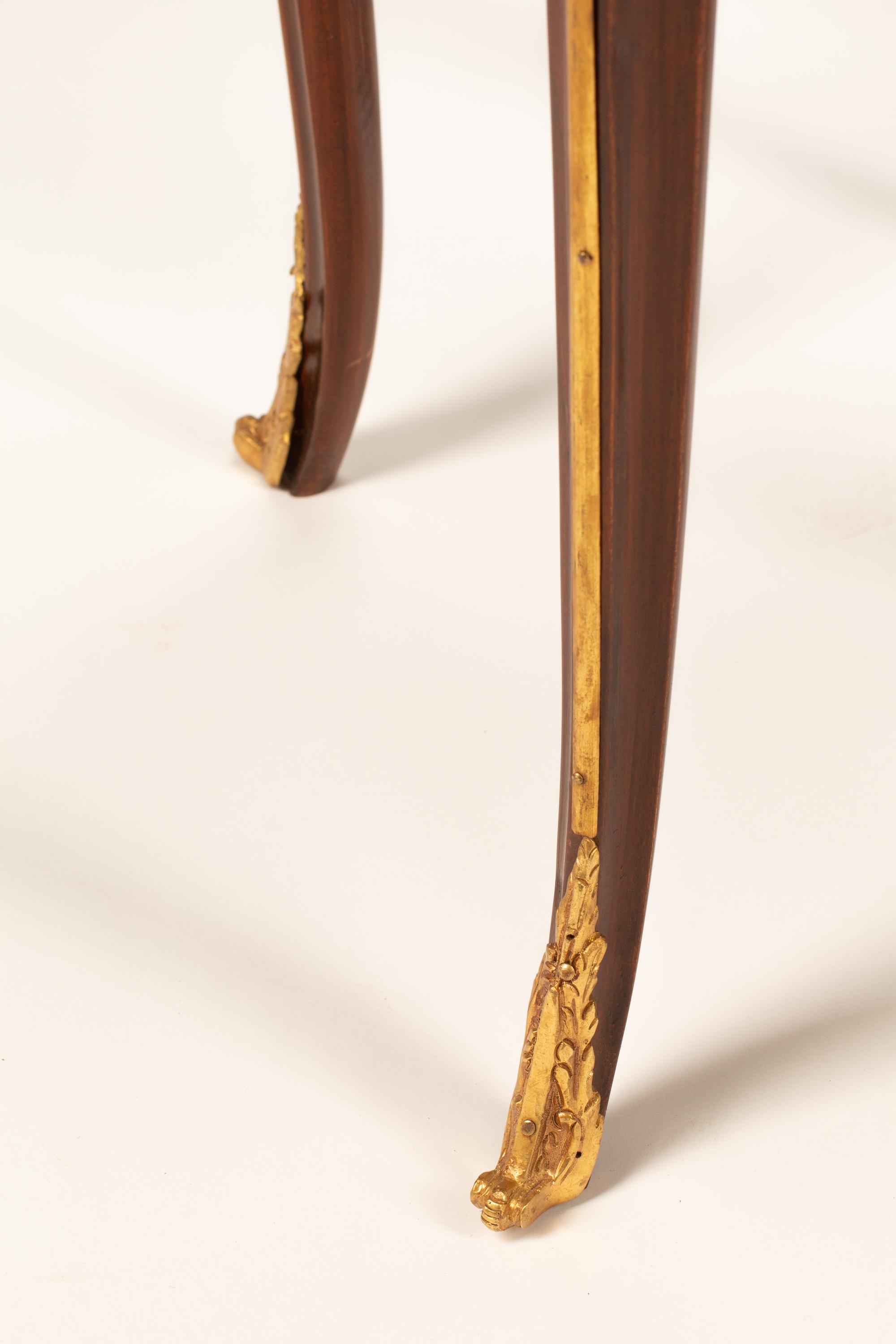 A Pair of Louis XV Style Gilt Bronze and Gilt Metal Mounted Marble-Top Gueridons