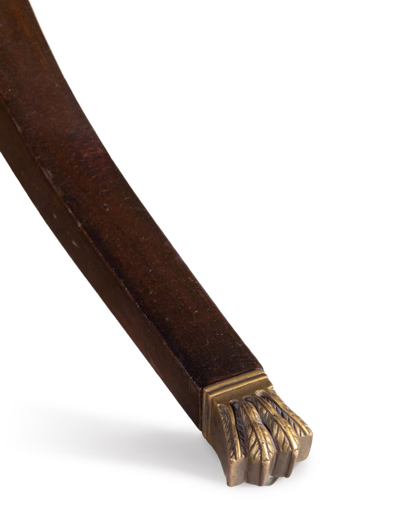 A Regency Style Macassar Ebony Oval Dining Table Top on an Associated Base