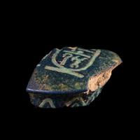 An Egyptian Bichrome-Faience Djed Pillar Fragment with the Cartouche of Amenhotep III