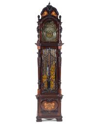 A Victorian Carved Mahogany and Marquetry Nine-Tube Tall Case Clock