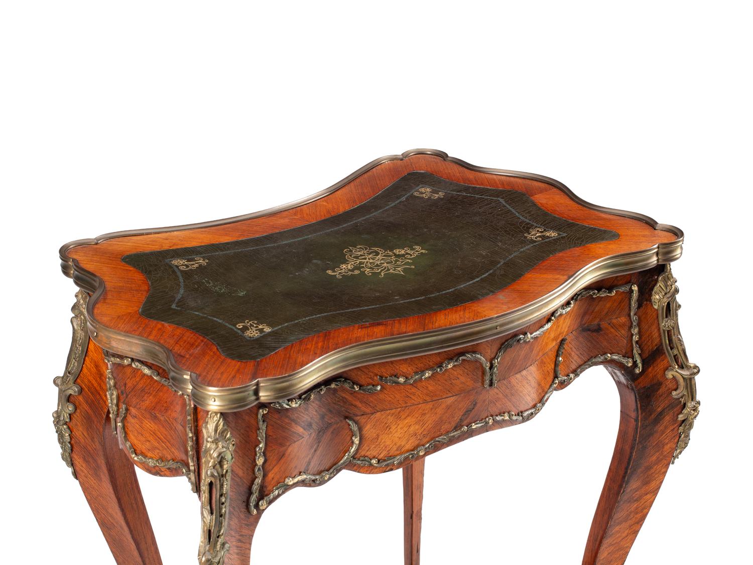 A Louis XV Style Gilt Bronze Mounted Kingwood and Parquetry Writing Table