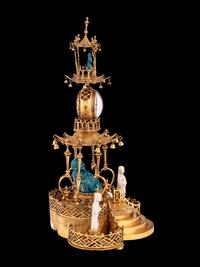 A Louis XV Style Gilt Bronze and Chinese Porcelain Mounted Pagoda-Form Mantel Clock