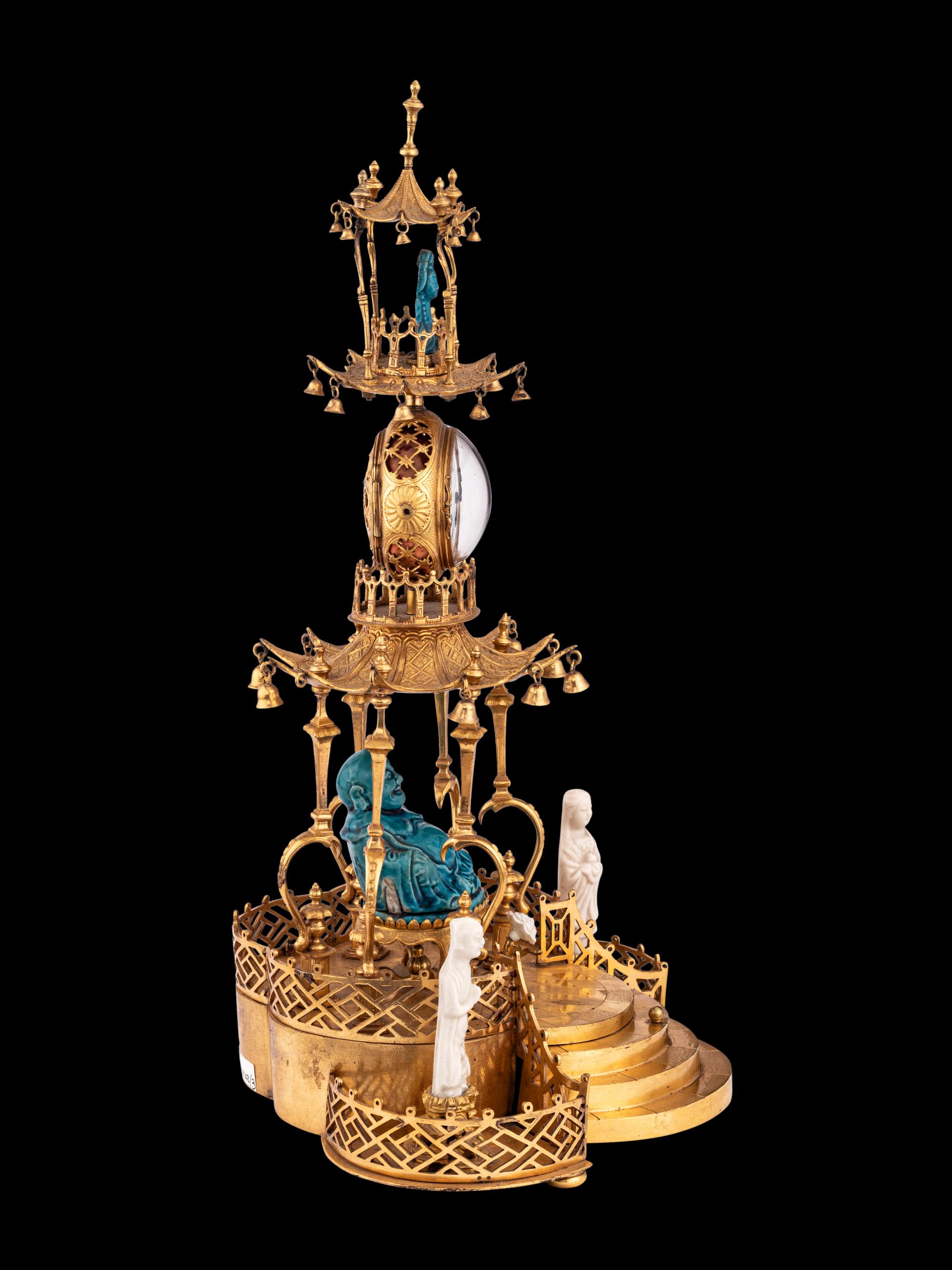 A Louis XV Style Gilt Bronze and Chinese Porcelain Mounted Pagoda-Form Mantel Clock