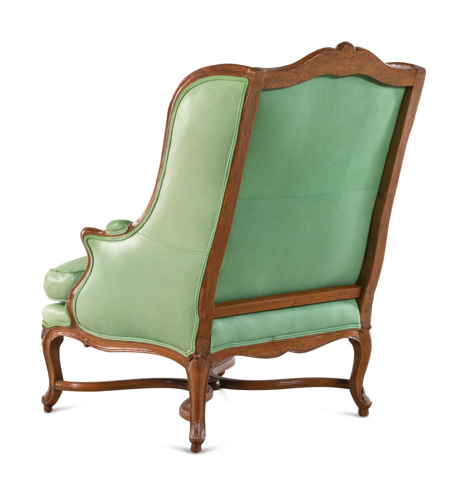 A Louis XV Leather-Upholstered Beechwood Bergère