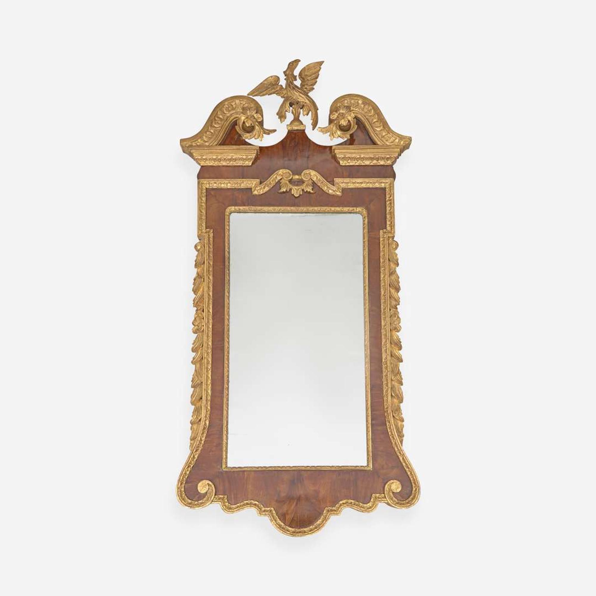 A Chippendale mahogany and parcel-gilt looking glass 19th century
