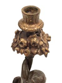 A Pair of Continental Gilt and Patinated Bronze and Marble Figural Candlesticks