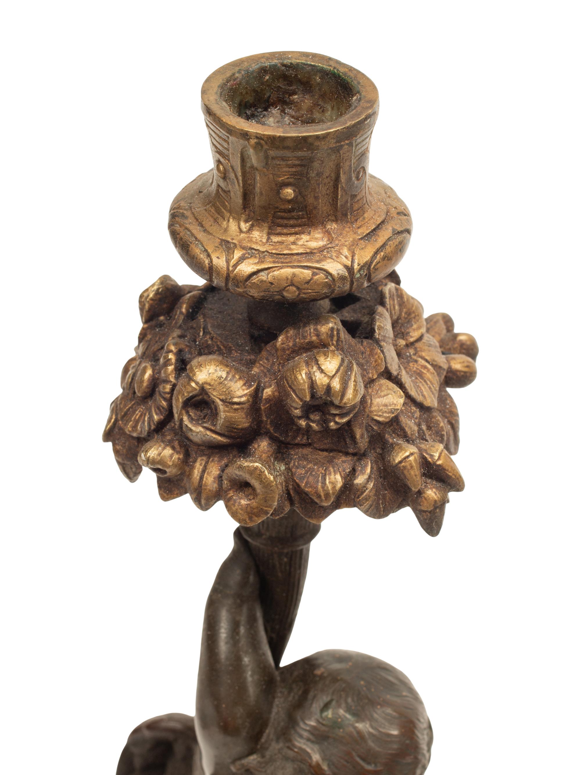 A Pair of Continental Gilt and Patinated Bronze and Marble Figural Candlesticks