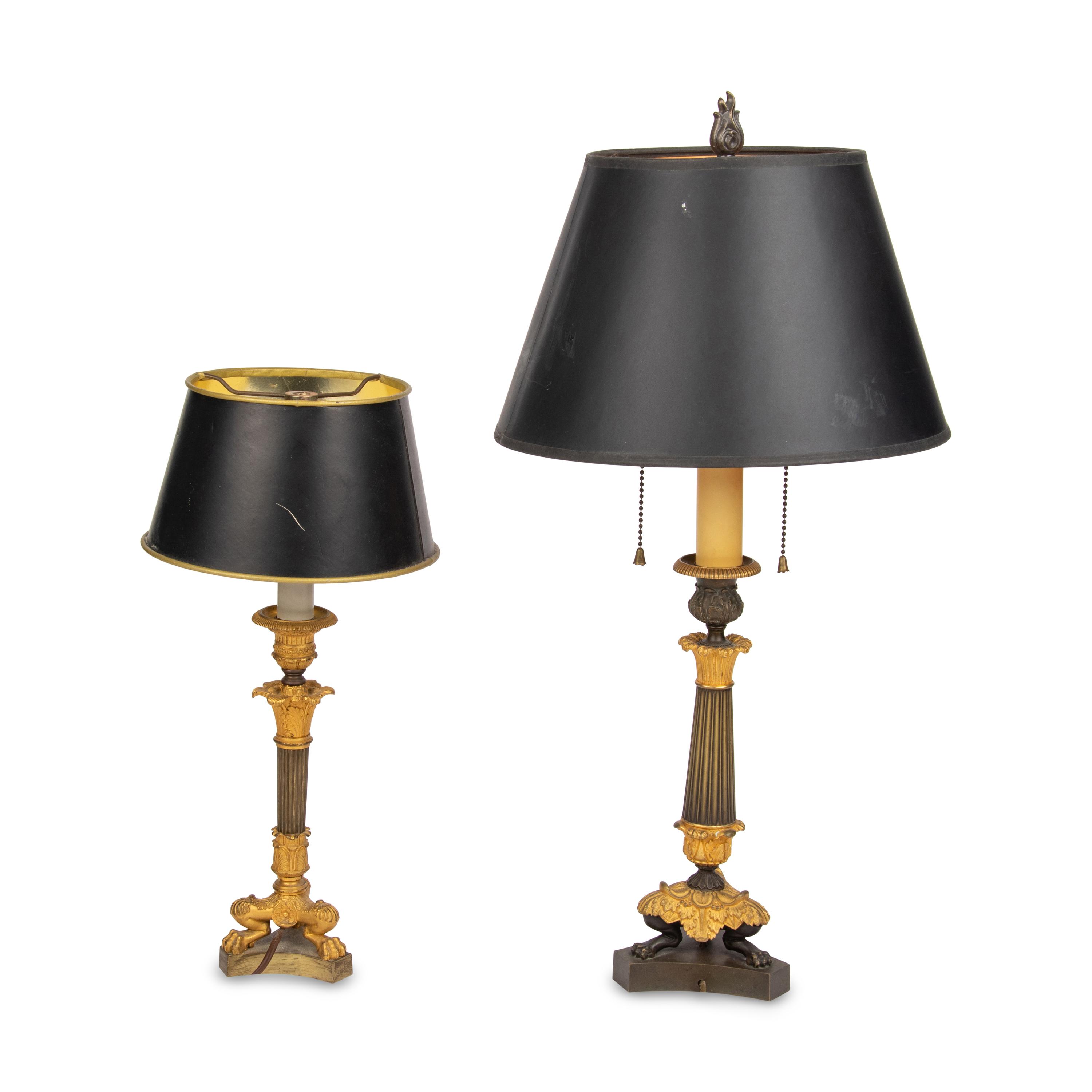 A Group of Two French Empire Style Parcel-Gilt Bronze Candlesticks Mounted as Lamps