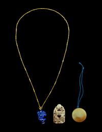 Three Chinese Jade and Hardstone Pendants