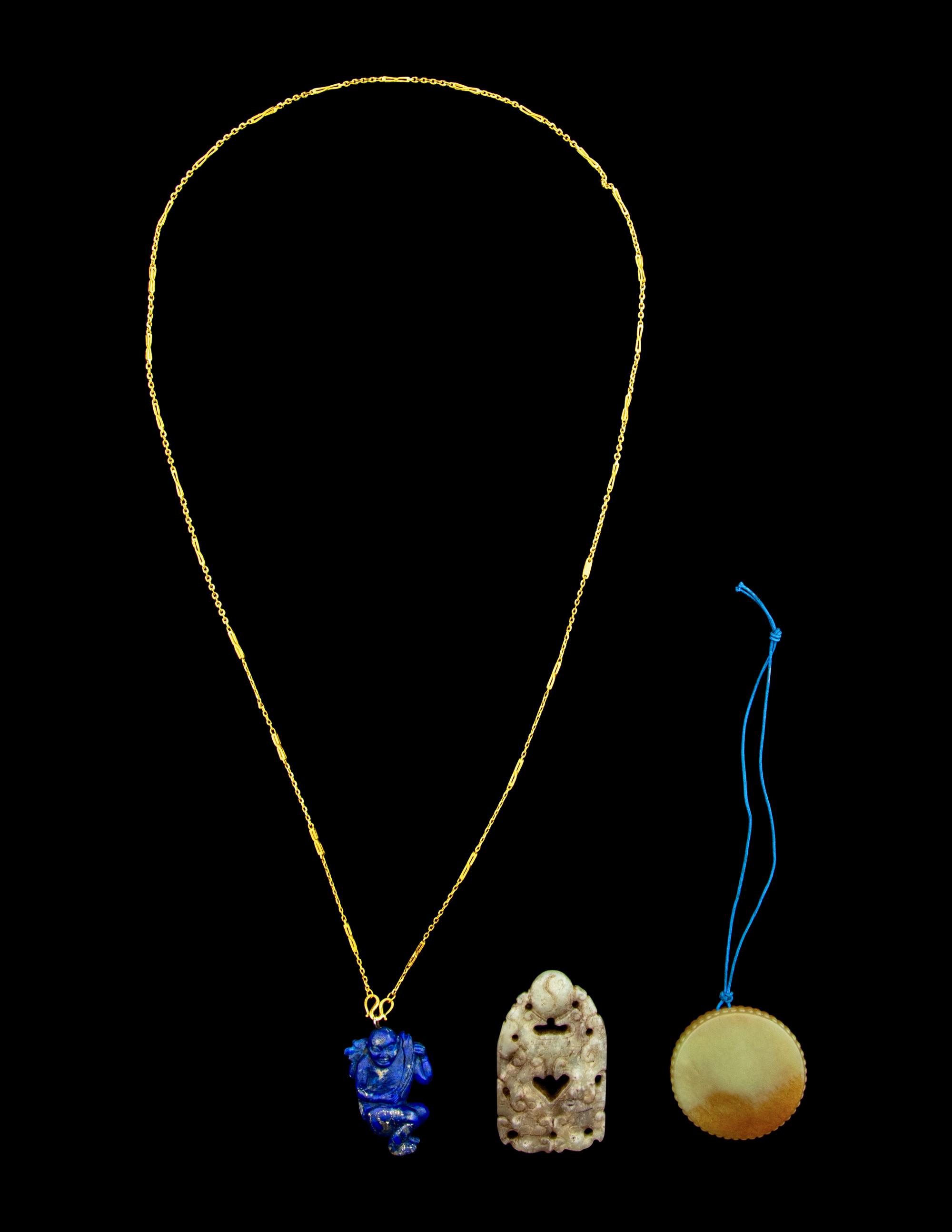 Three Chinese Jade and Hardstone Pendants
