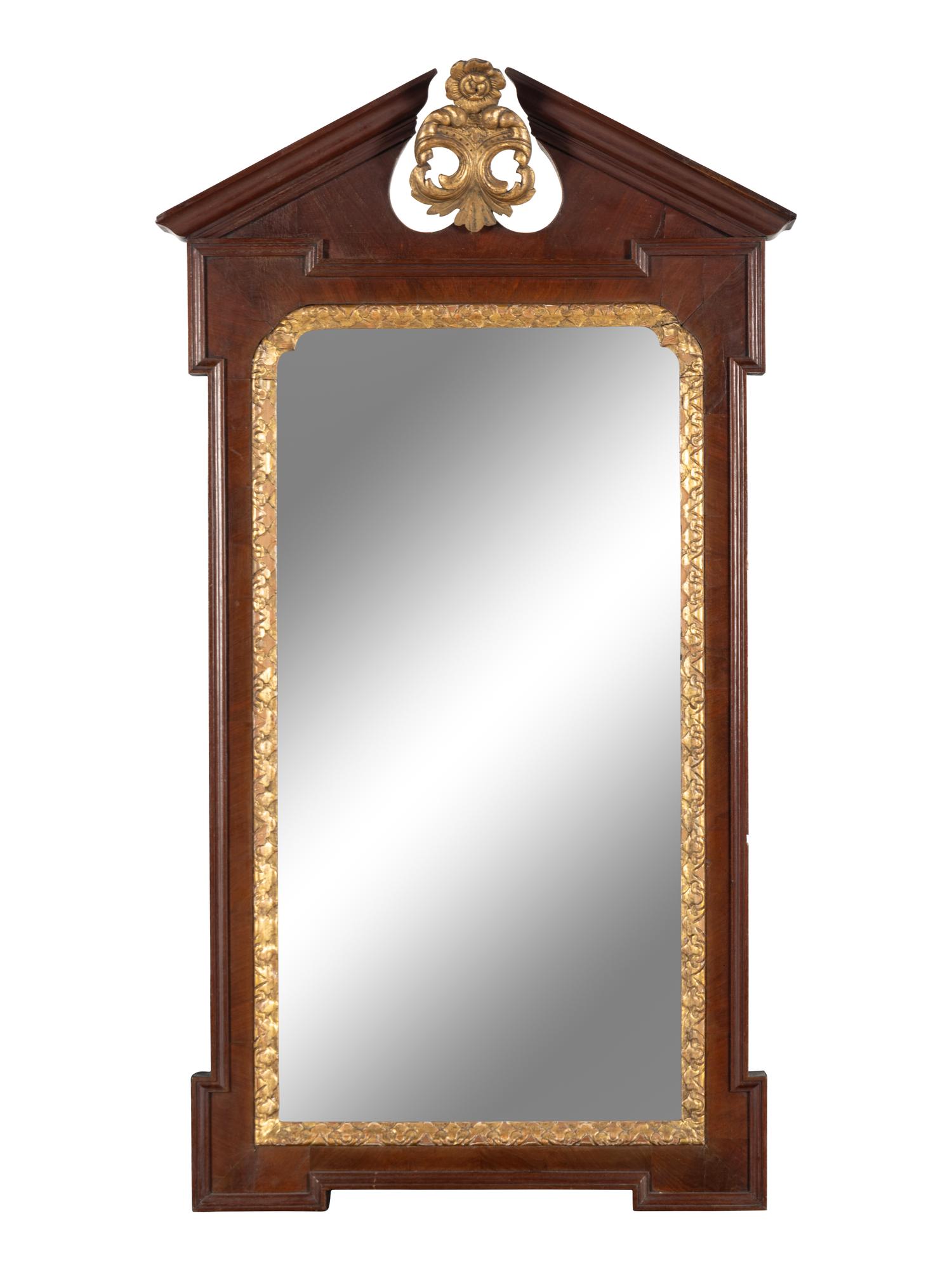 A Late George III Carved Mahogany and Parcel Gilt Mirror