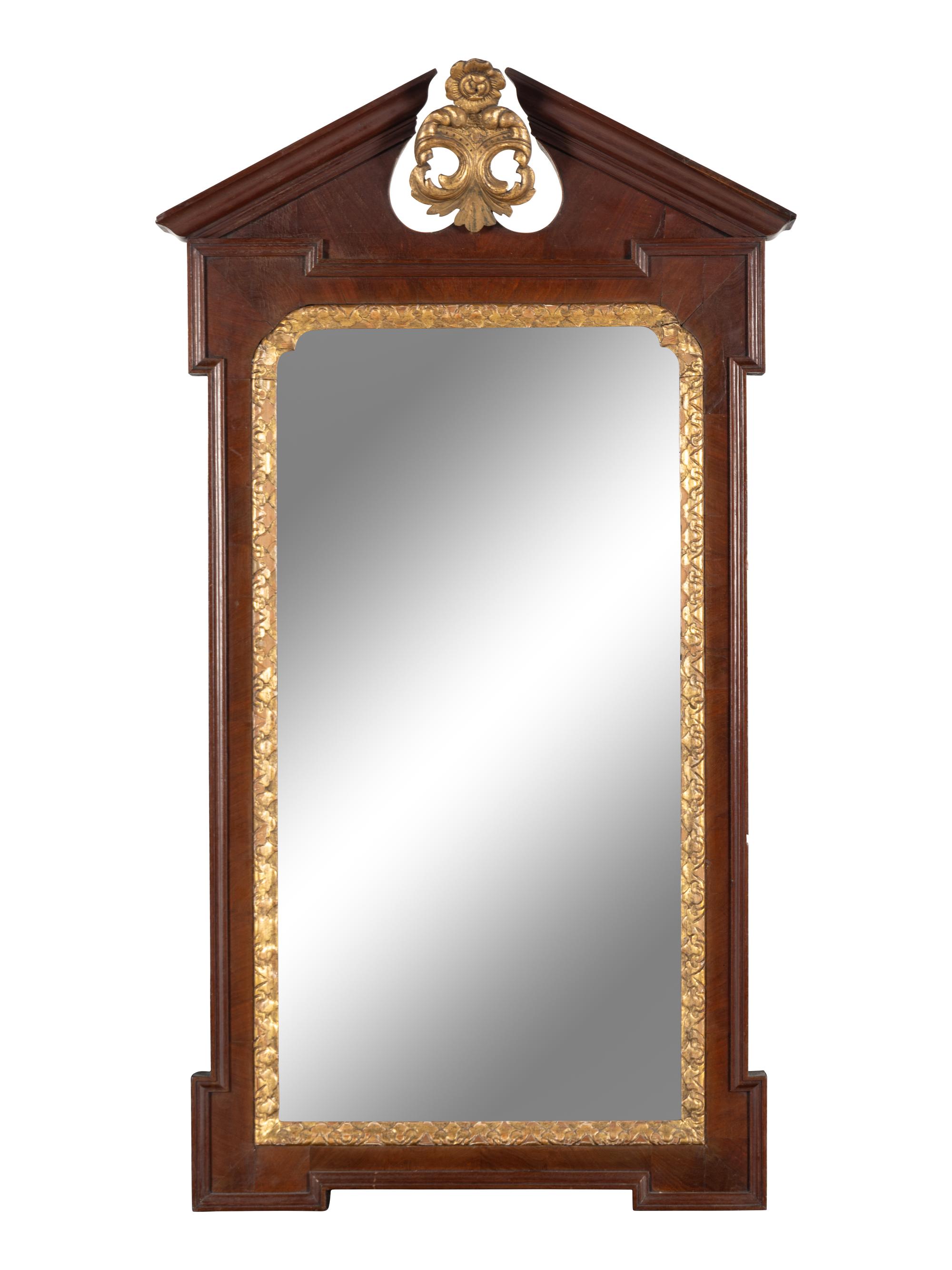 A Late George III Carved Mahogany and Parcel Gilt Mirror
