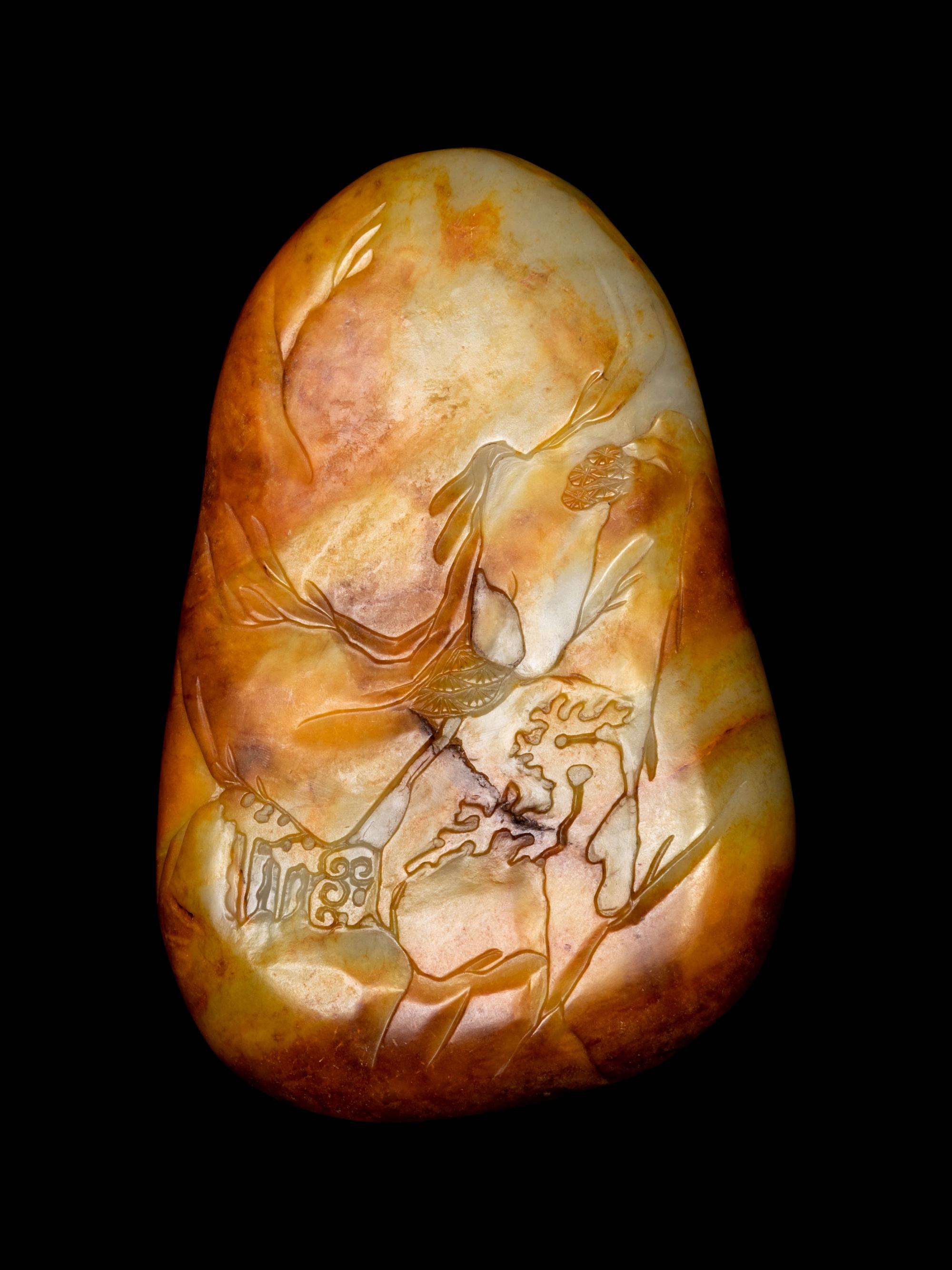 A Chinese Celadon, Russet and Yellow Jade Boulder