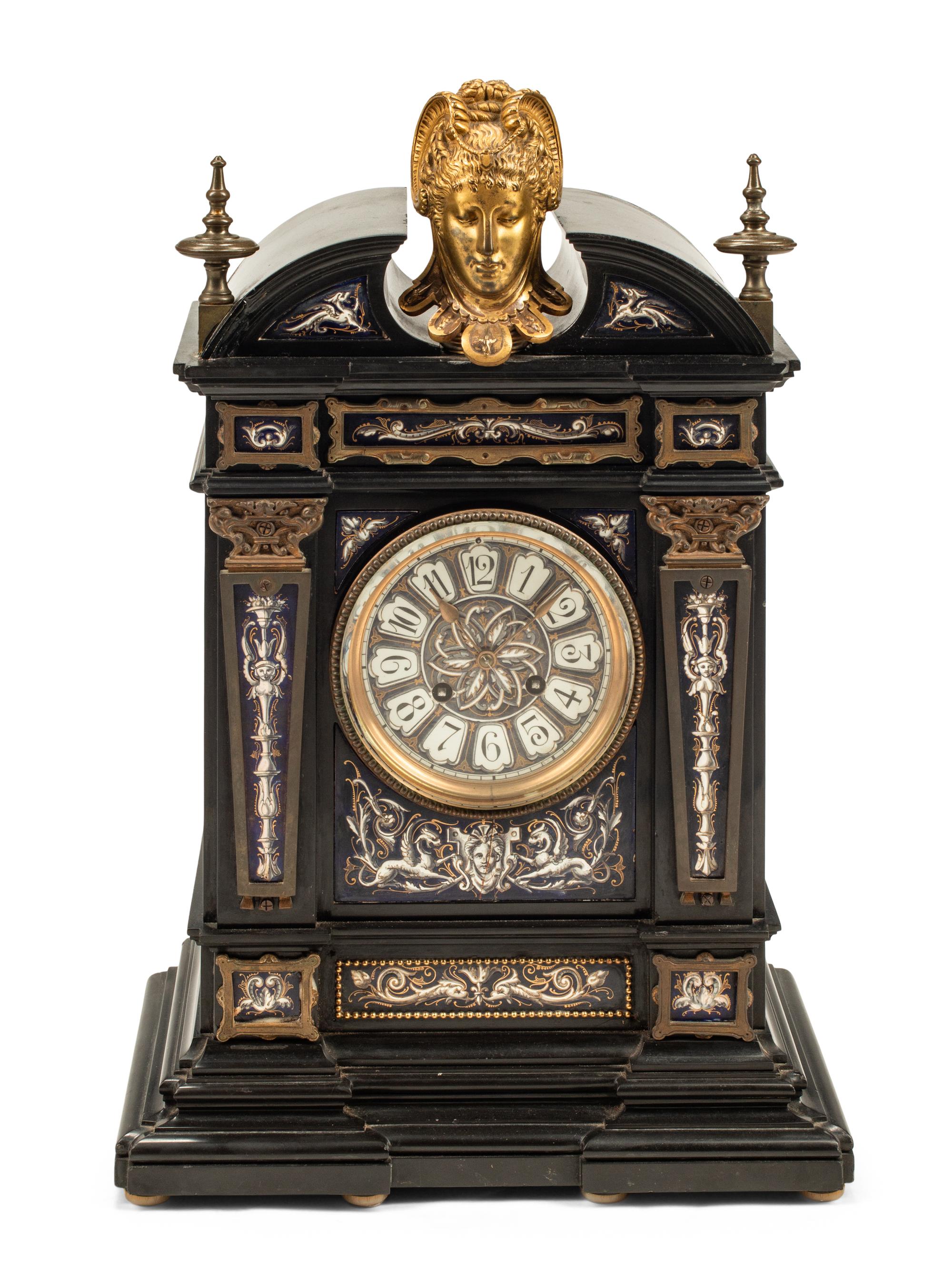 A French Gilt Bronze Mounted and Porcelain-Inset Black Marble Clock