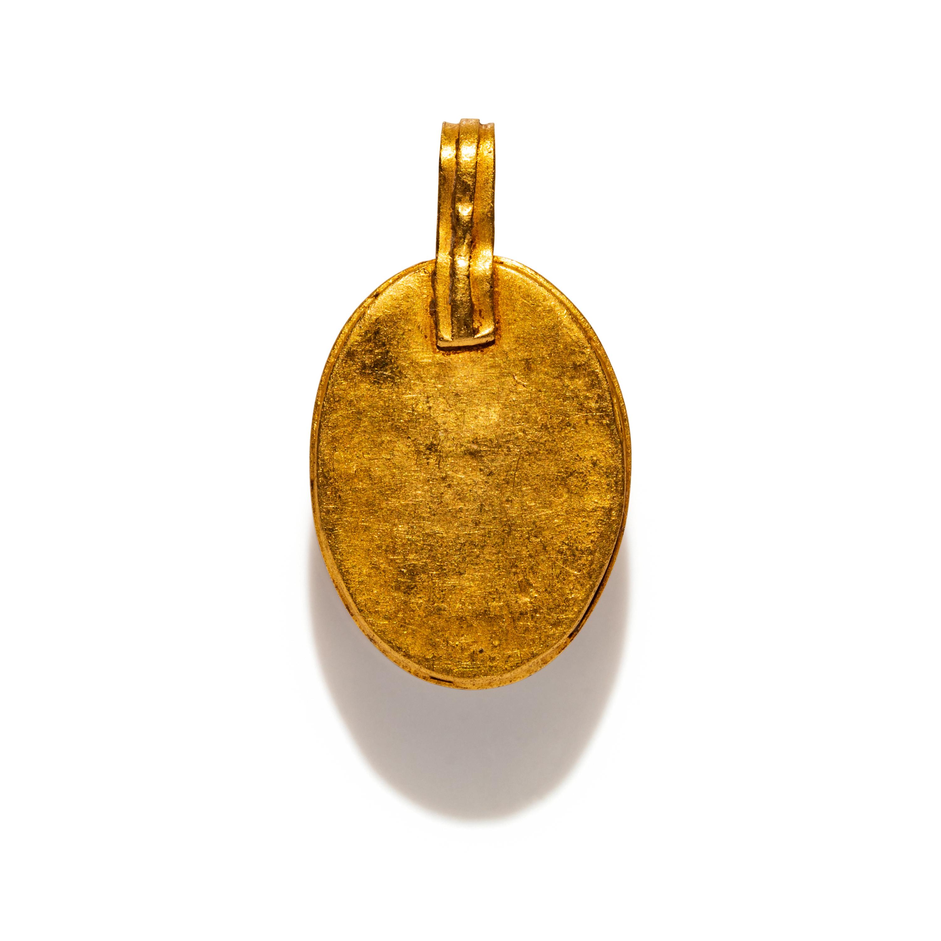A Carnelian and Gold Pendant with an Erotic Scene