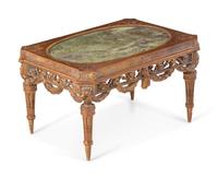 A Louis XVI Style Parcel Gilt Low Table