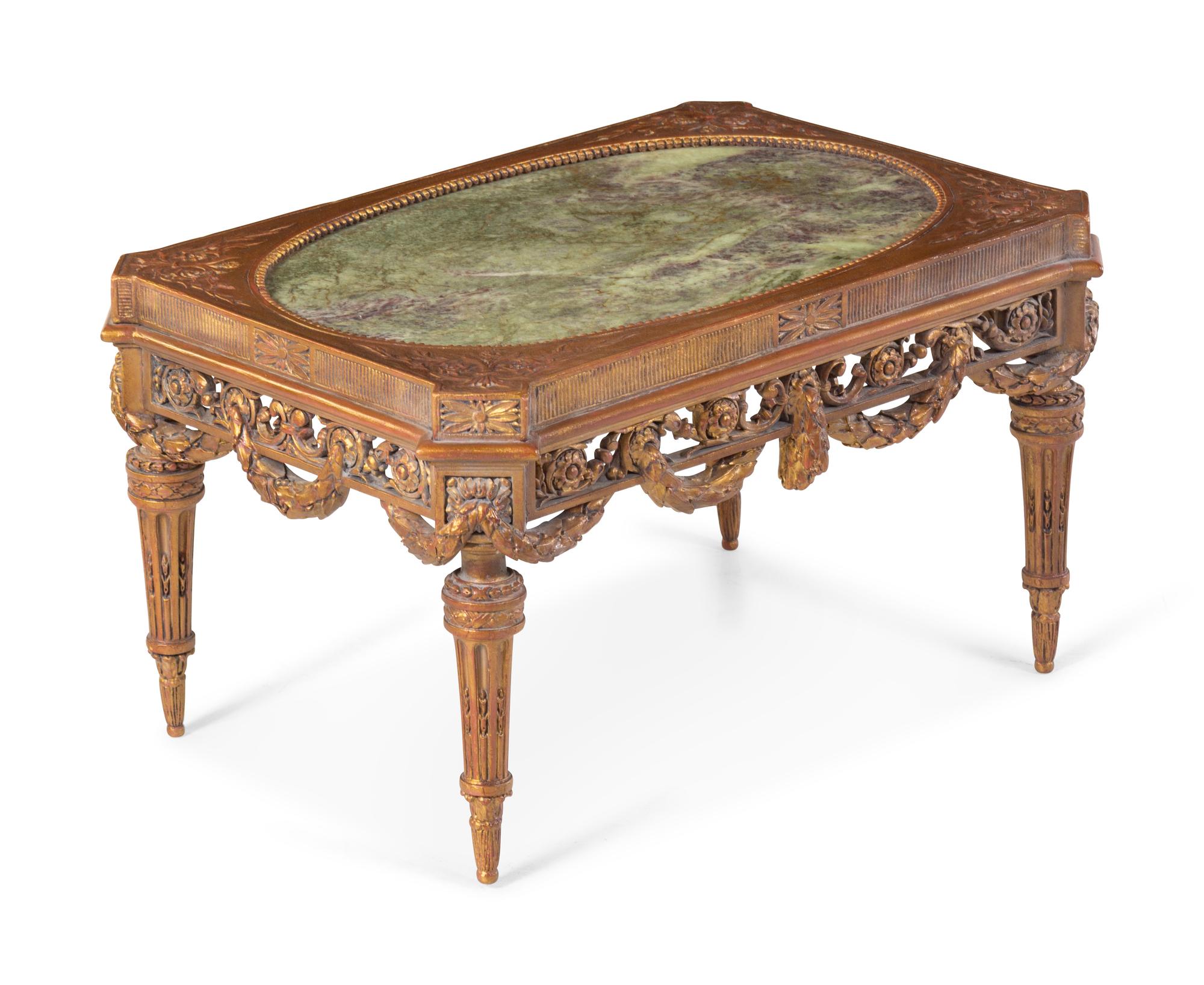 A Louis XVI Style Parcel Gilt Low Table