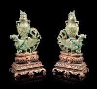 A Pair of Carved Celadon Jade Animal-Form Covered Vessels Height of each 12 1/2 inches. — 20TH CENTURY