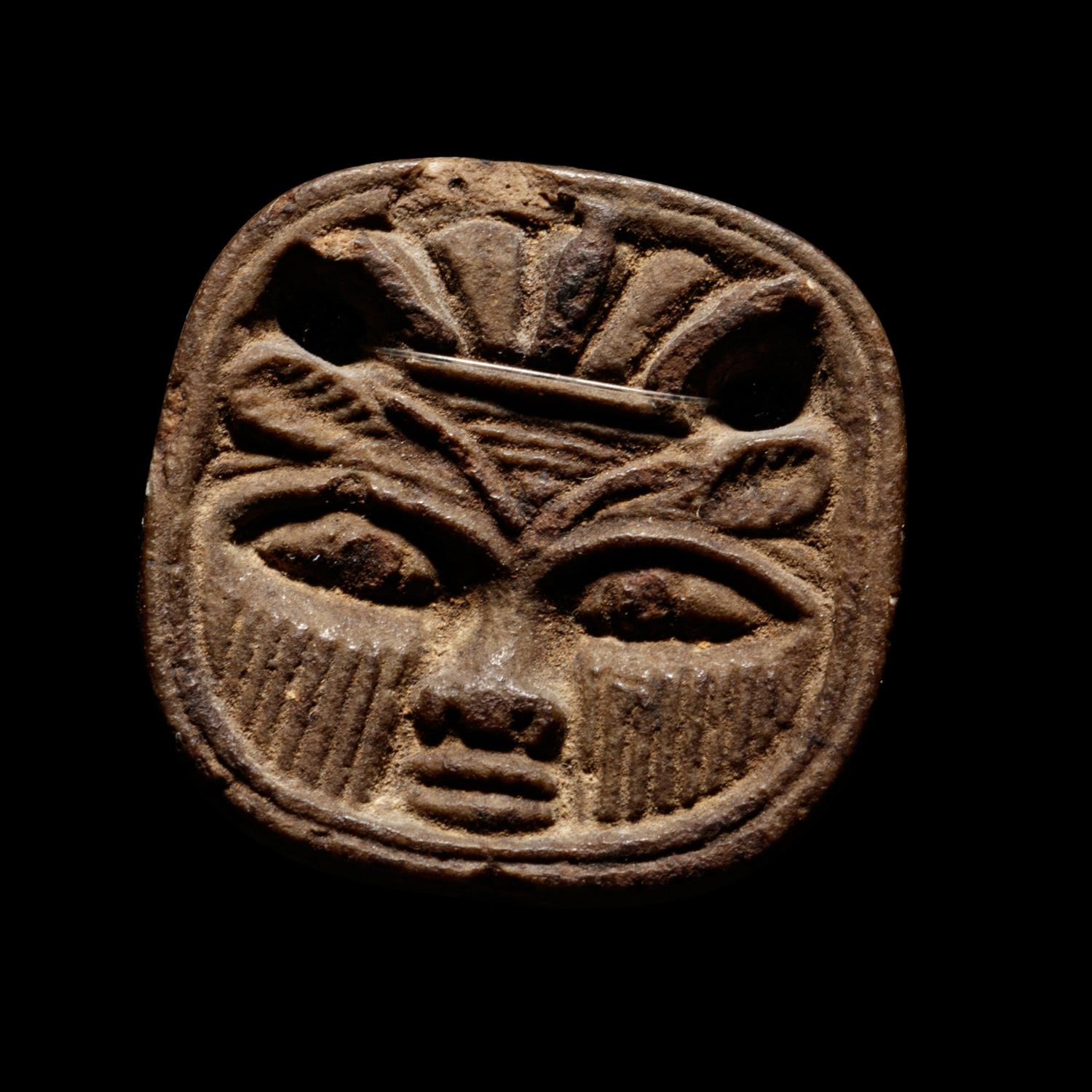 An Egyptian Faience Bes