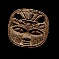 An Egyptian Faience Bes