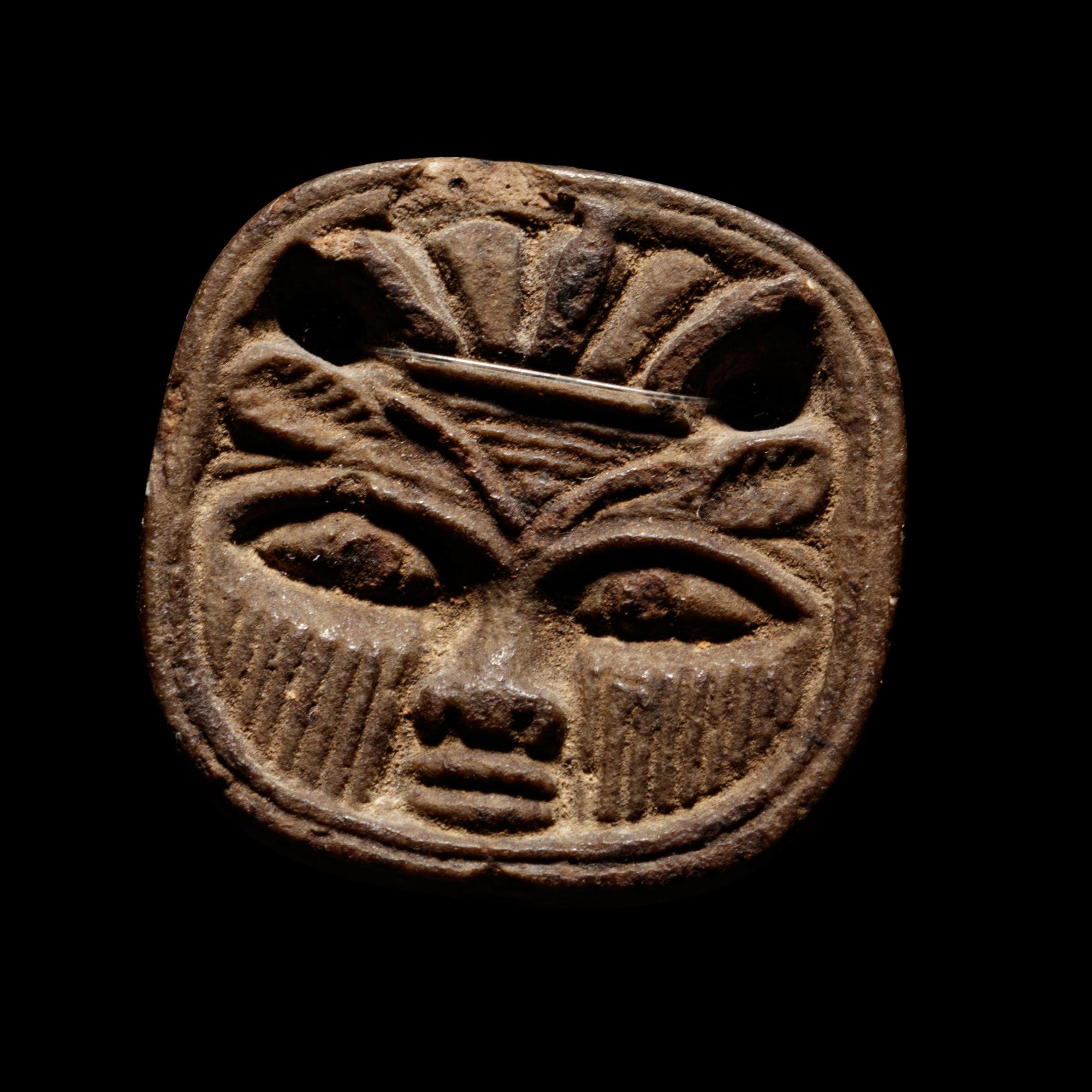 An Egyptian Faience Bes