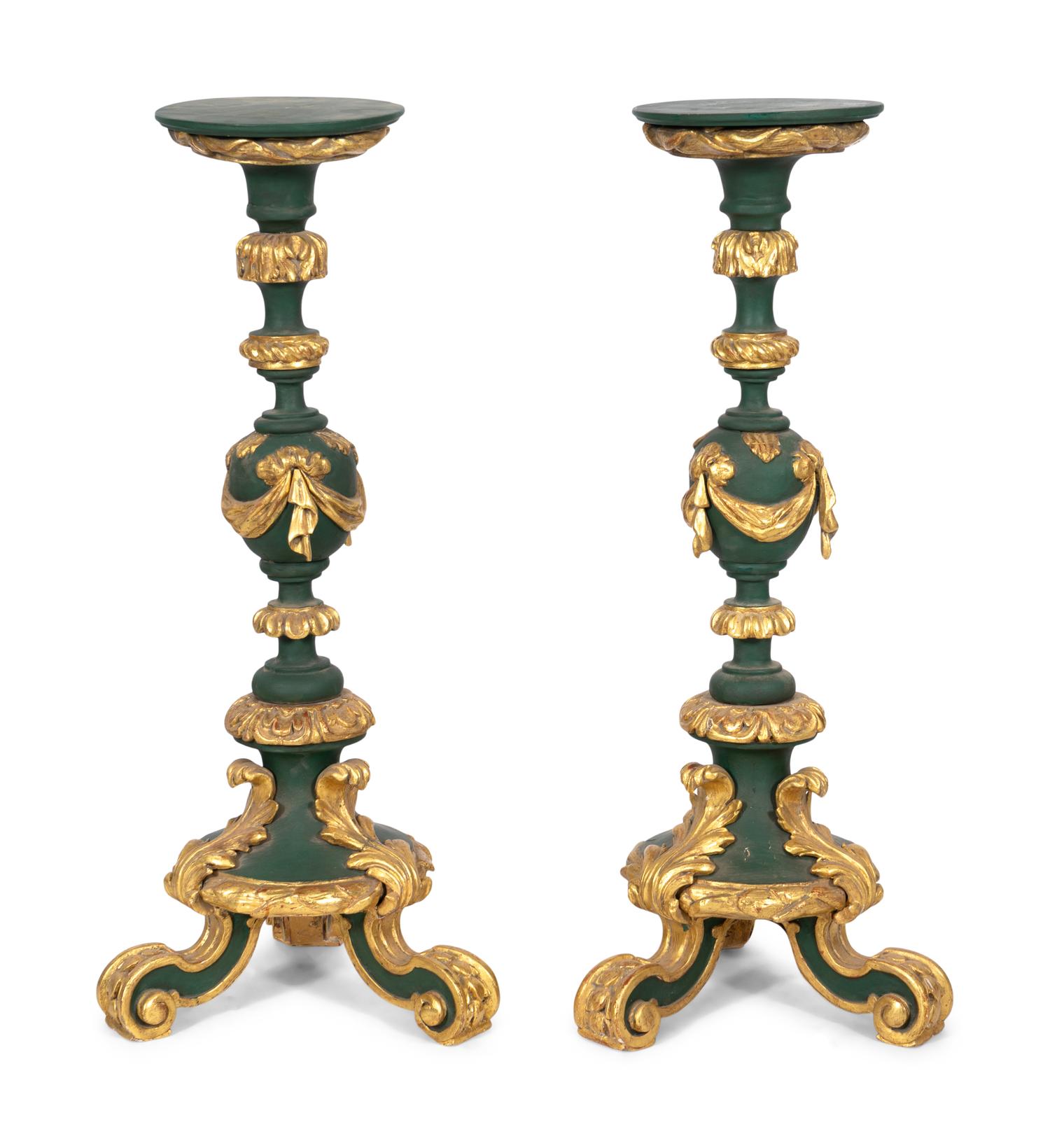 A Pair of Large Italian Painted and Parcel Gilt Prickets