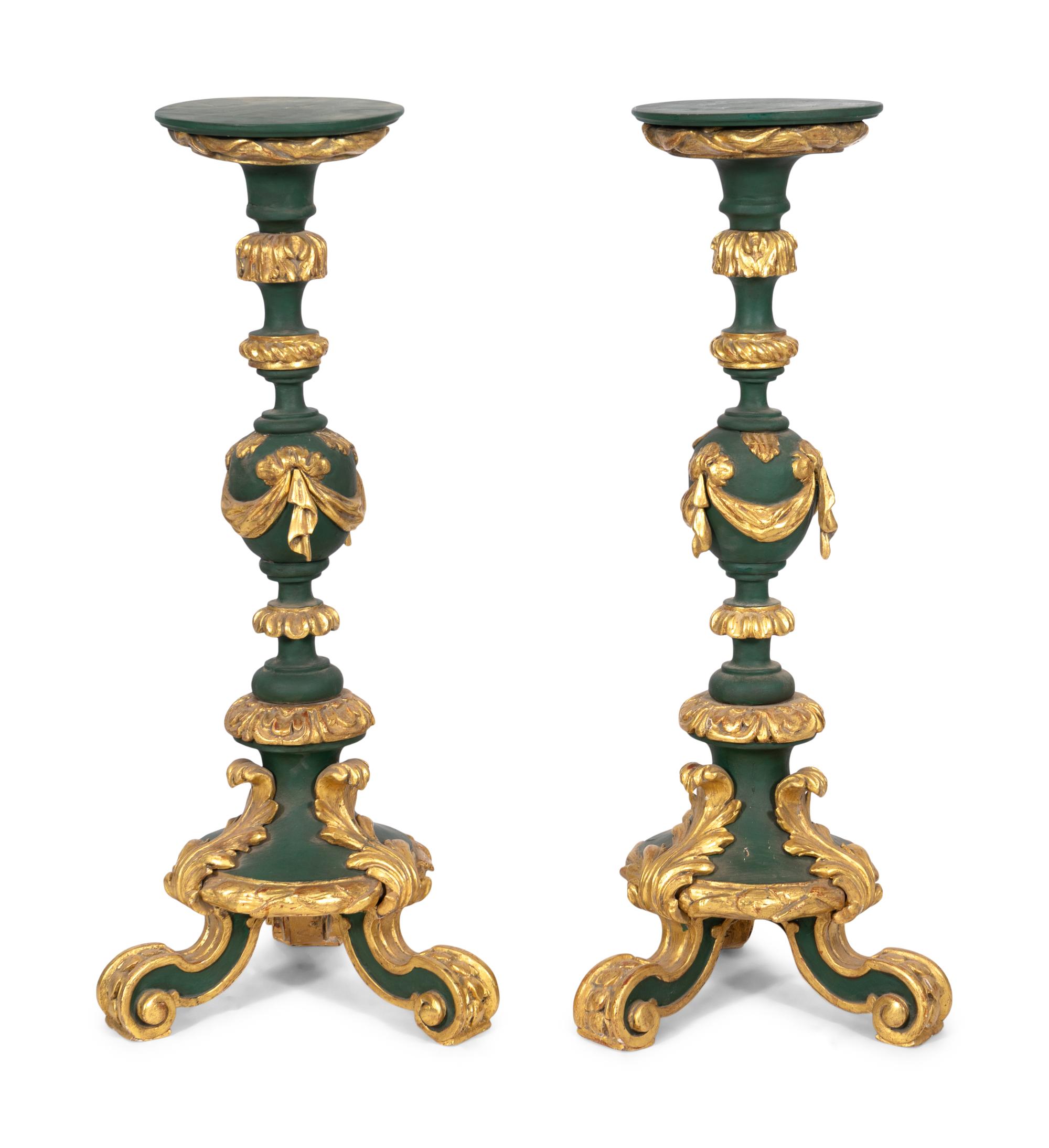A Pair of Large Italian Painted and Parcel Gilt Prickets