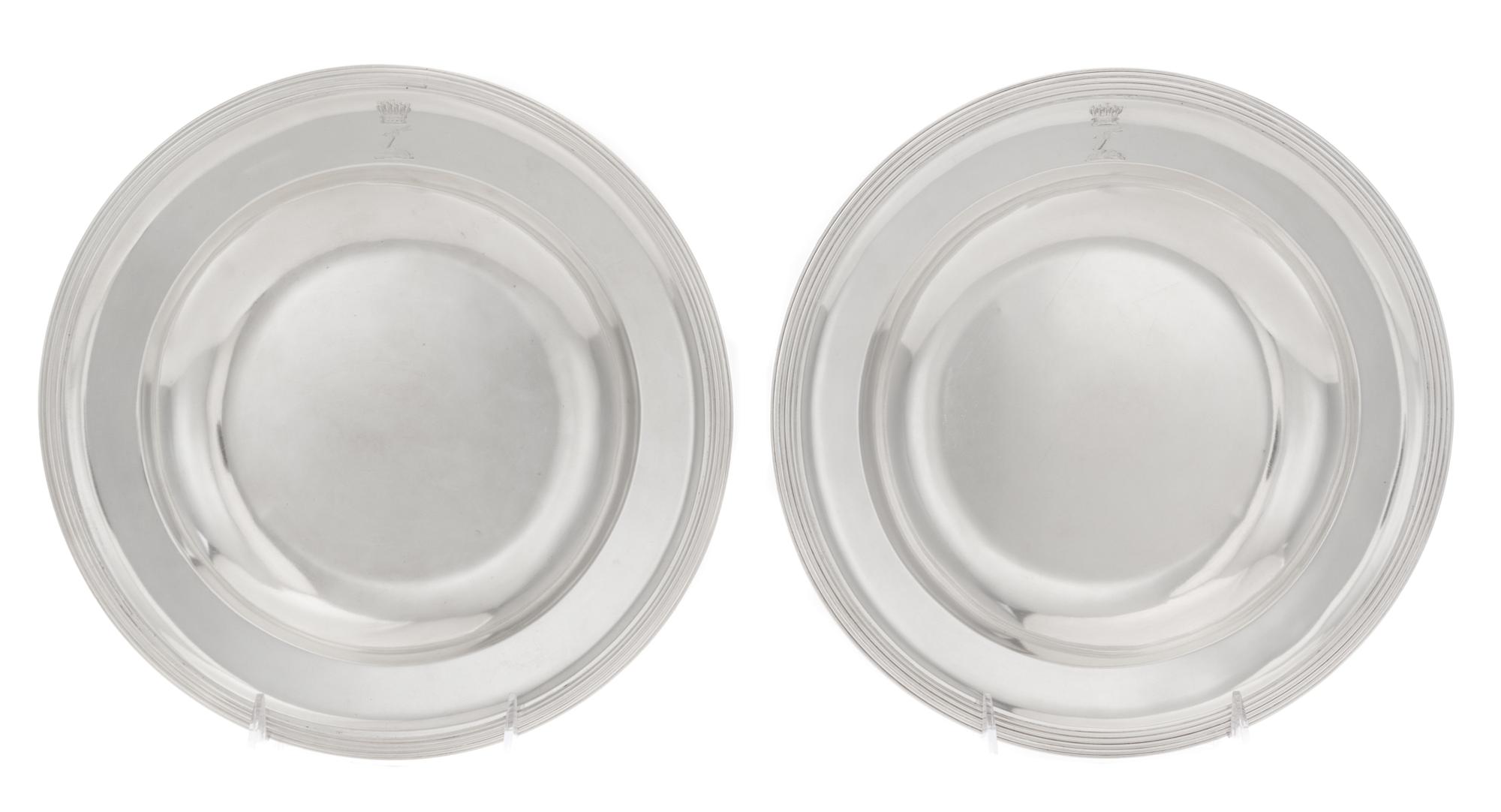 A Pair of Austrian Silver Plates, 1798-1799, circular with reeded rims, the borders engraved with later crest of an arm embowed graspin