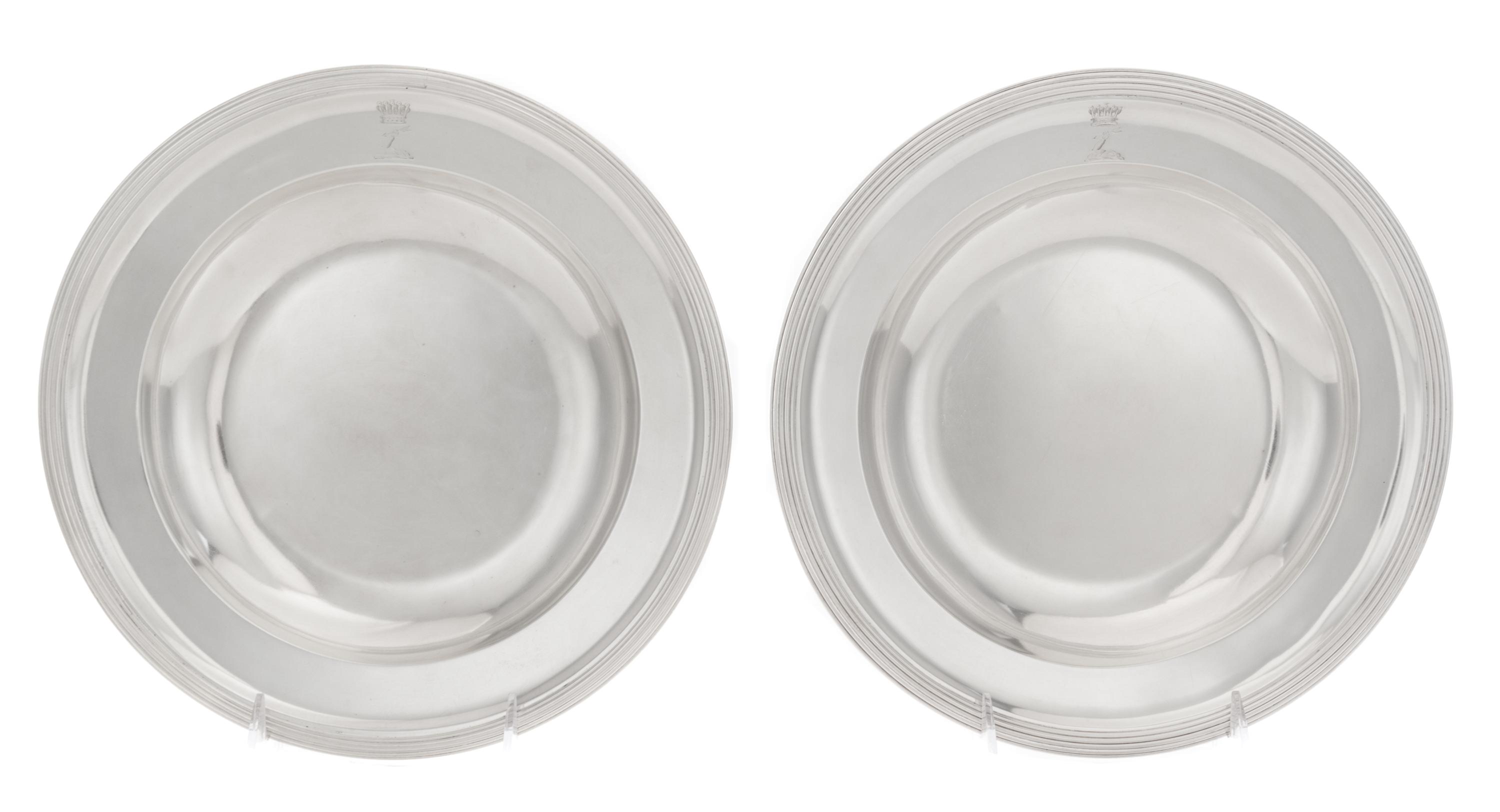 A Pair of Austrian Silver Plates, 1798-1799, circular with reeded rims, the borders engraved with later crest of an arm embowed graspin
