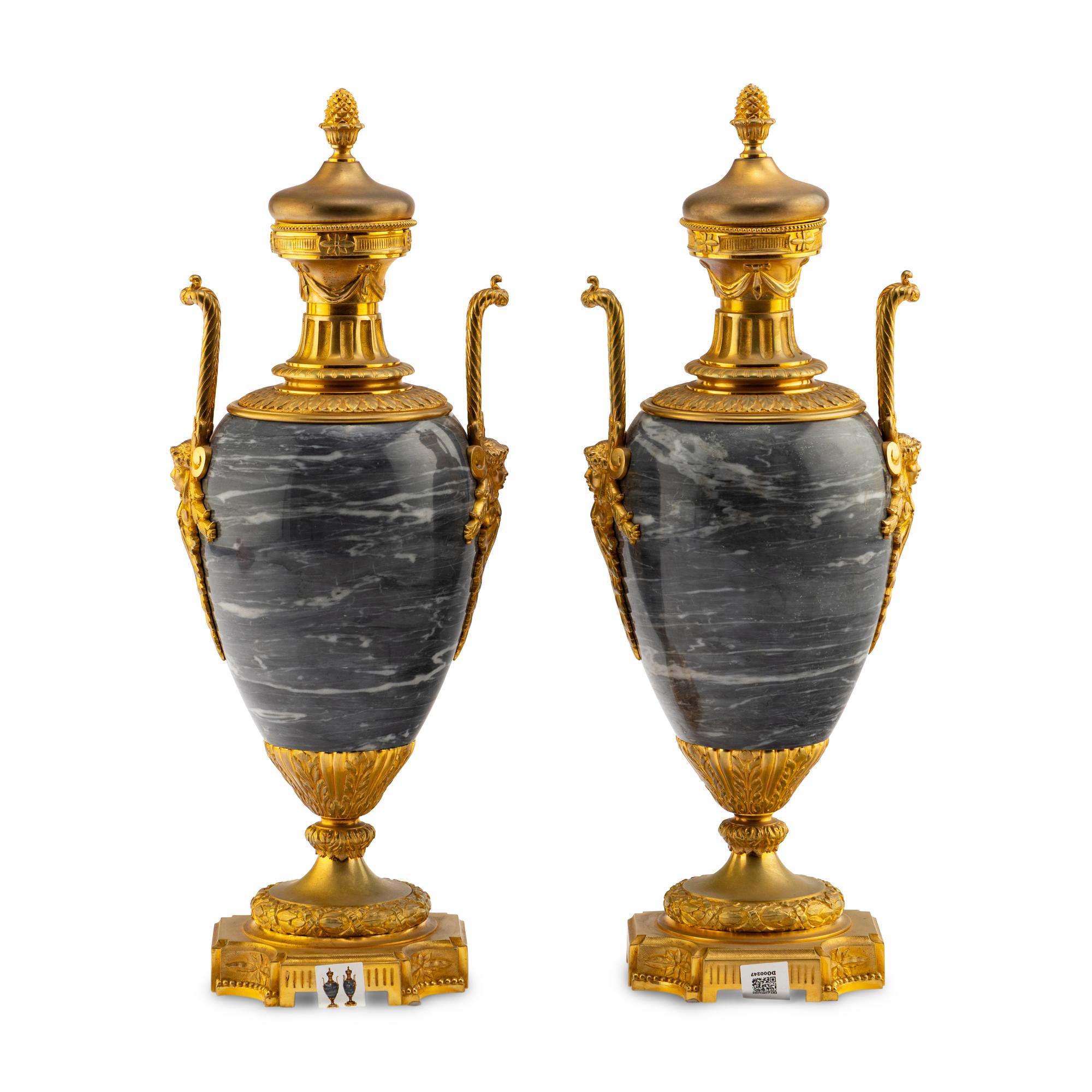 A Pair of Louis XVI Style Gilt Bronze Mounted Marble Urns