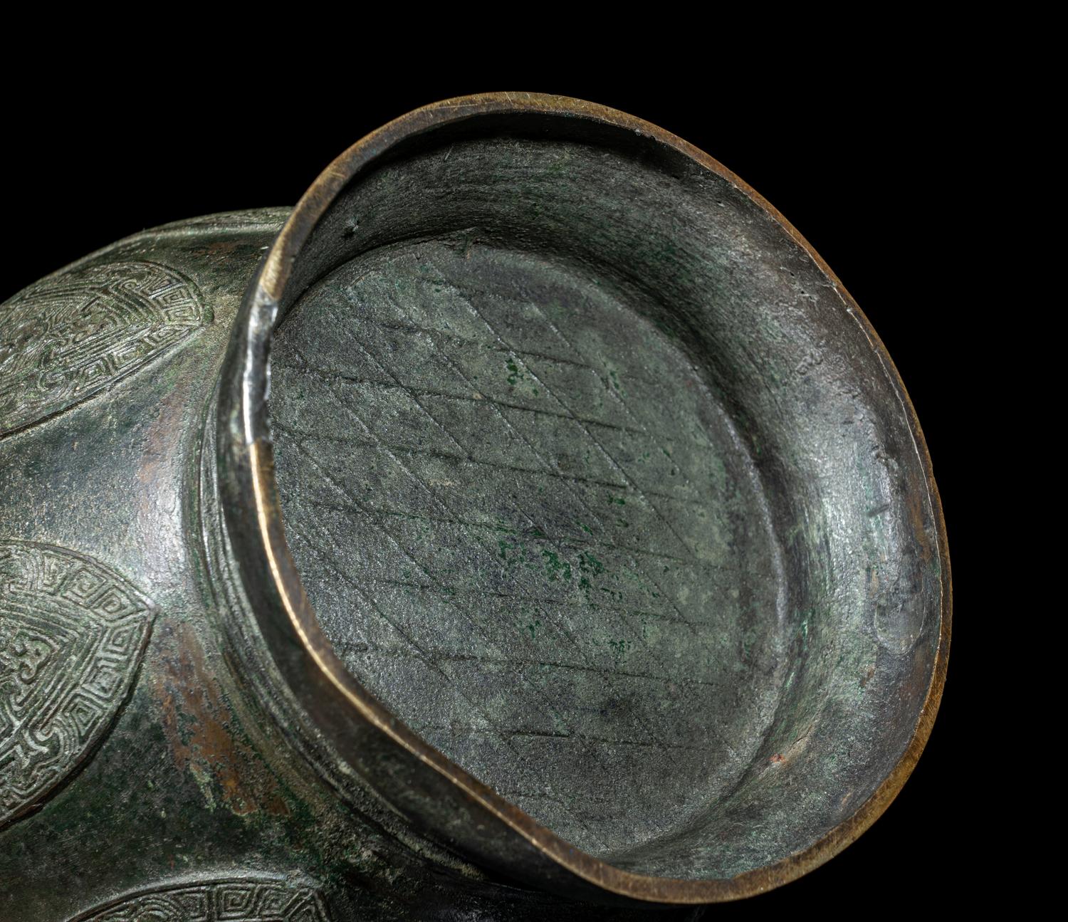 A Chinese Archaistic Bronze 'Three Rams' Hu Vessel