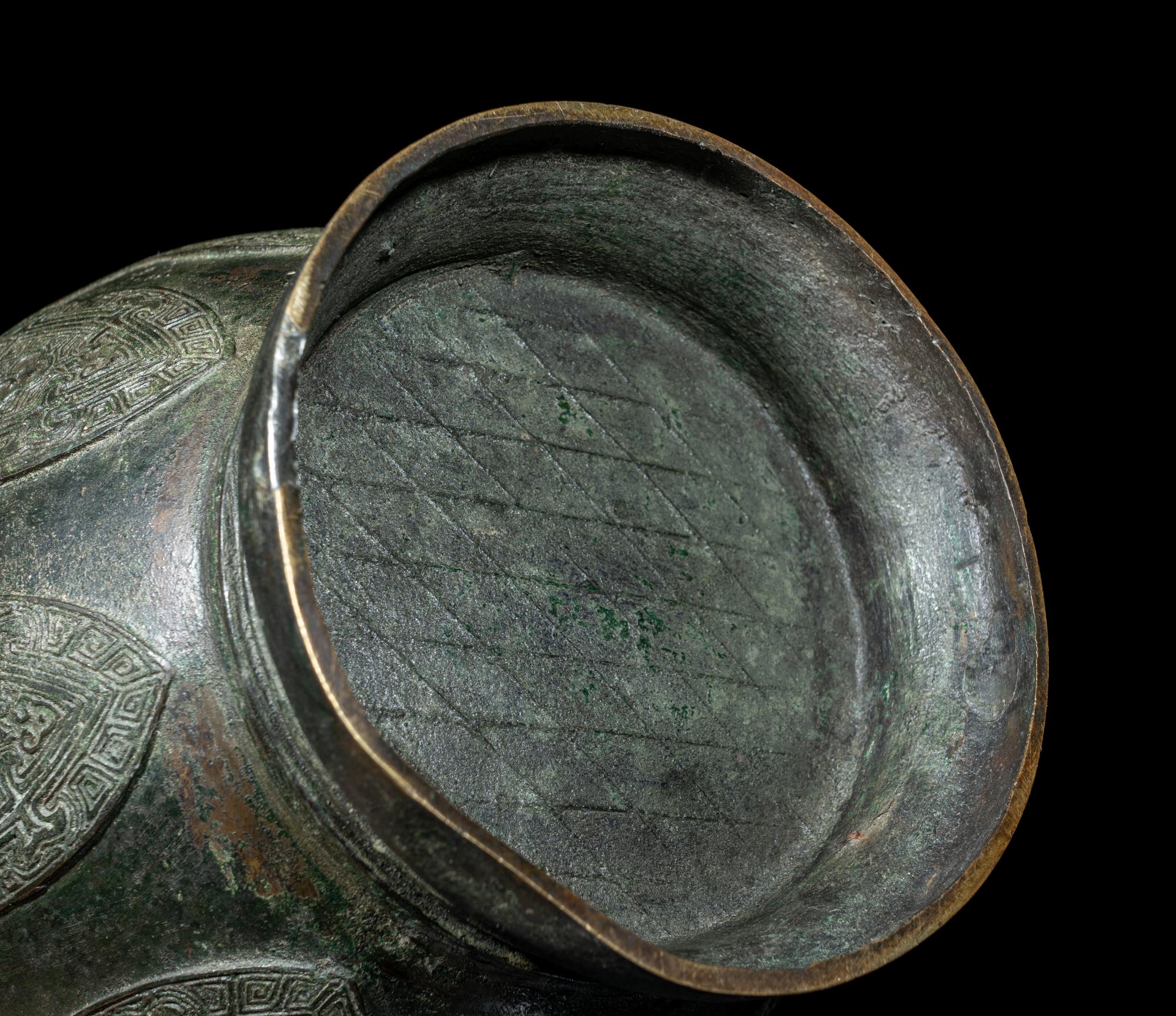 A Chinese Archaistic Bronze 'Three Rams' Hu Vessel