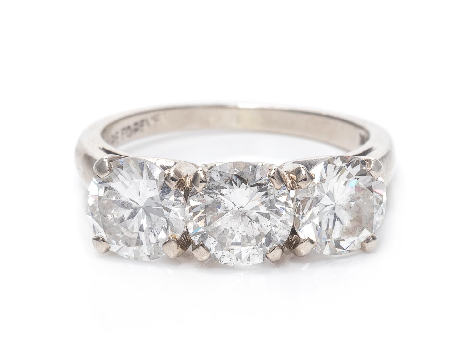 A 14 Karat White Gold and Diamond Ring,