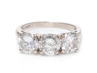 A 14 Karat White Gold and Diamond Ring,