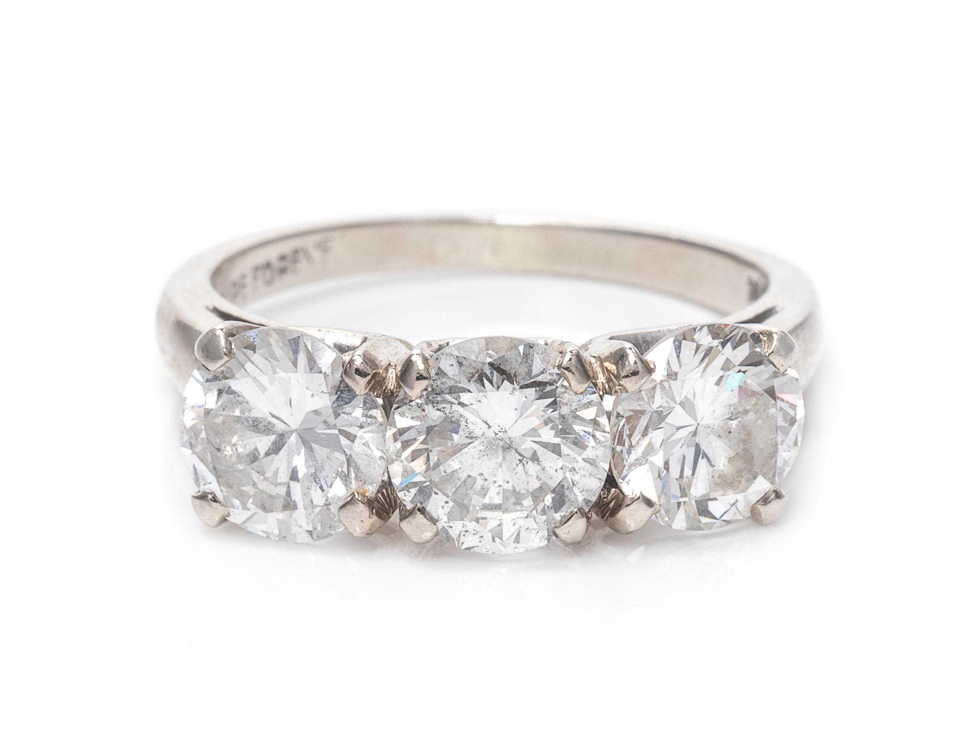 A 14 Karat White Gold and Diamond Ring,
