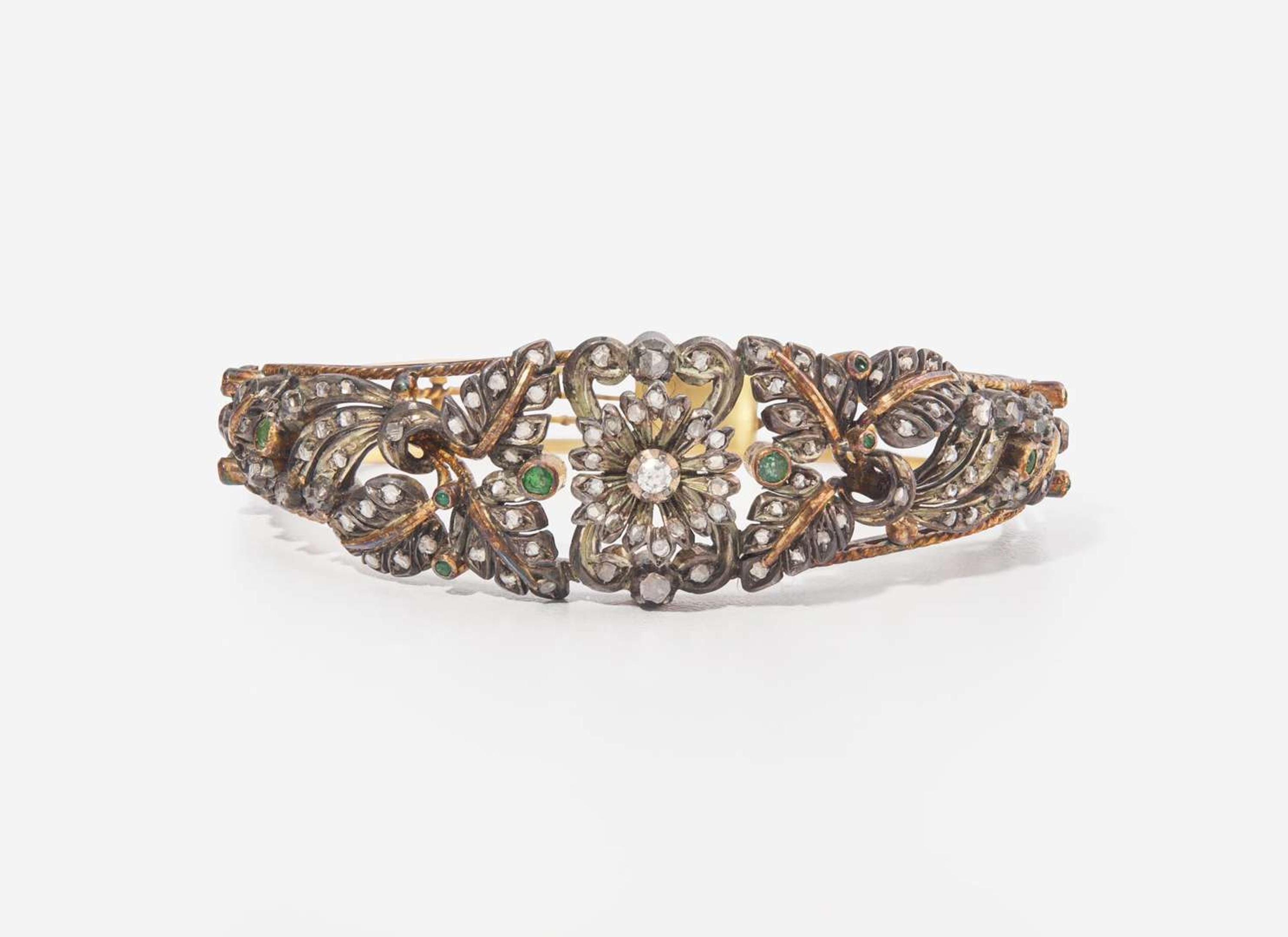 A Silver-Topped Yellow Gold, Diamond, and Emerald Bracelet