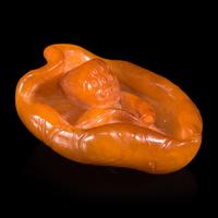 A Chinese 'Beeswax' Amber Lotus Pod and Leaf Pendant — 蜜蠟雕荷葉蓮蓬墜